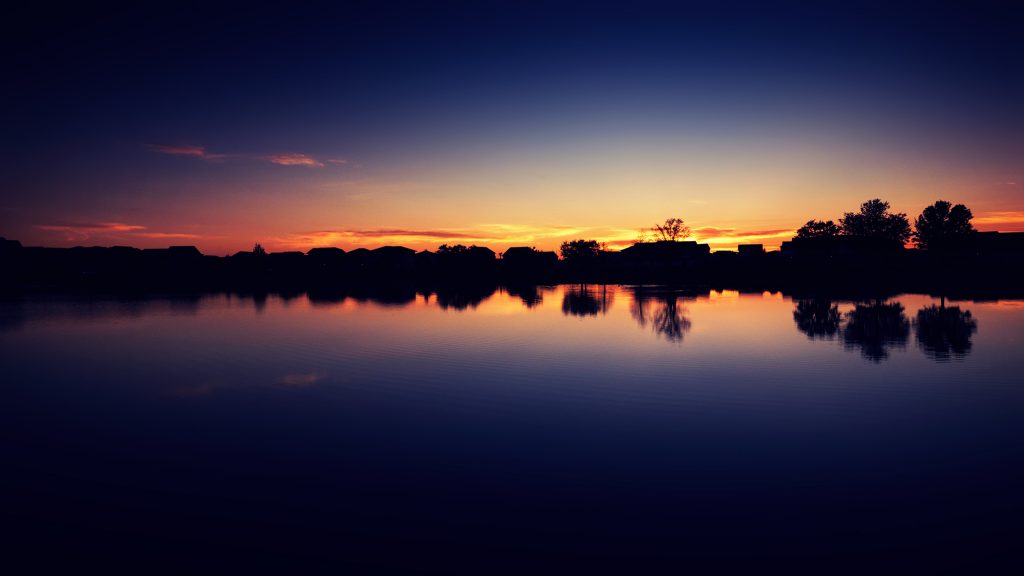 Dark Blue sunset reflecting in lake